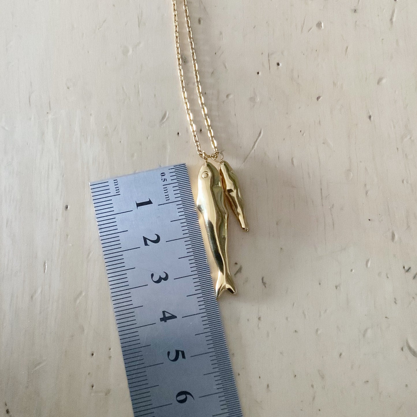 Pair of Fish Gold Necklace