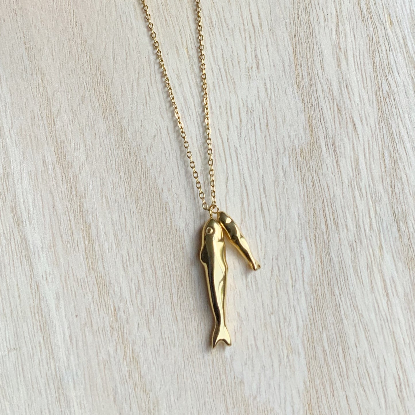Pair of Fish Gold Necklace